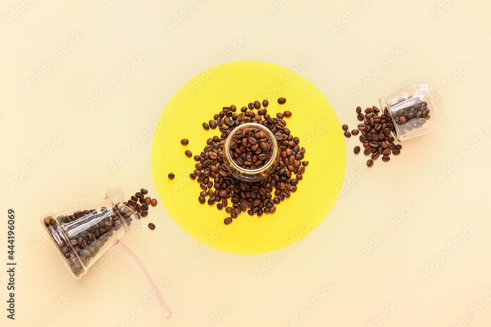 Composition with coffee beans on light background