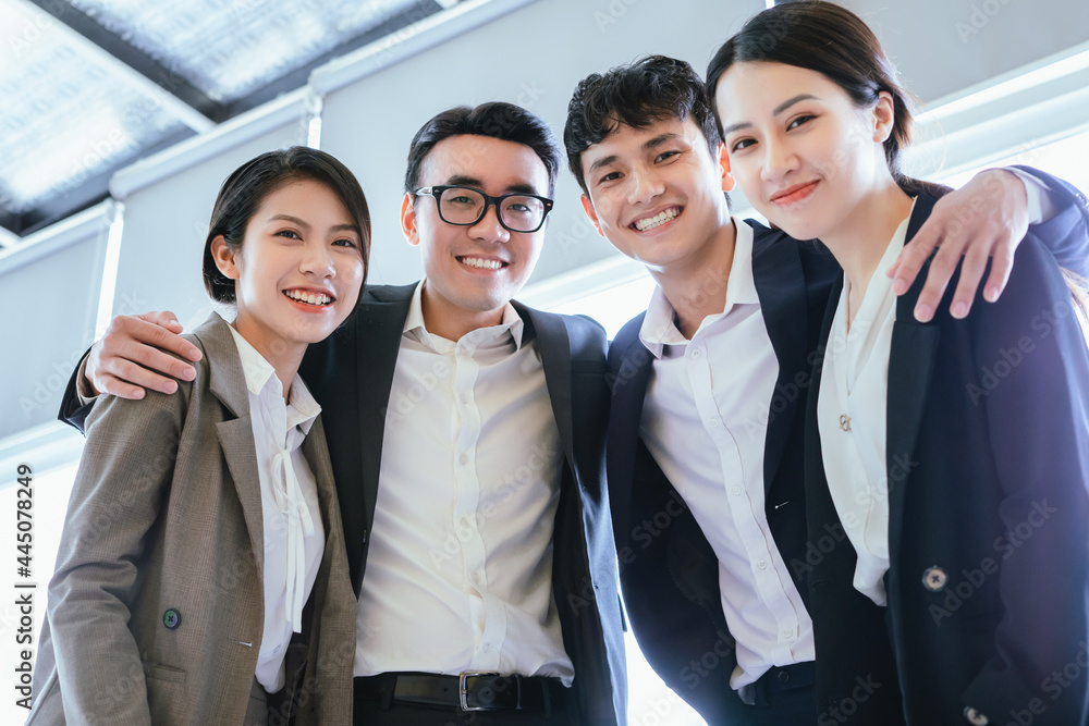 Group portrait of Asian business people