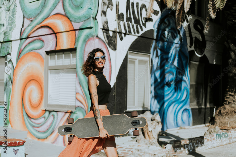 Cool woman with a longboard