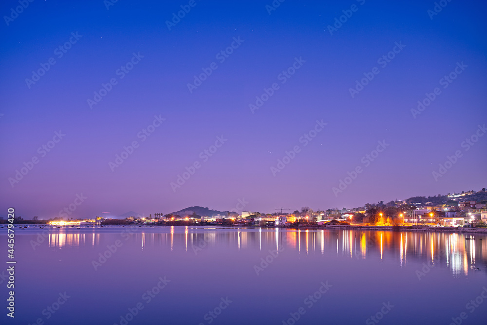 Beautiful night view of Lake Fusaro in Naples, Italy