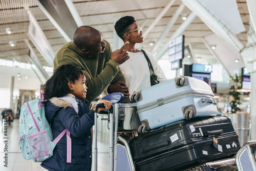 Tourist family waiting at international airport