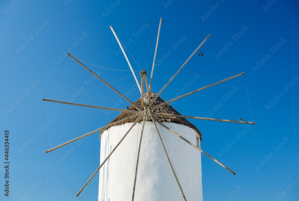 Mykonos, Greece. Traditional windmills. The symbol of Mykonos at the day time. Landscape with tradit