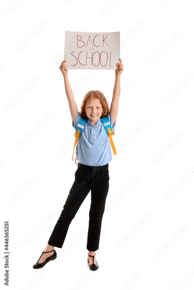 Cute little girl holding paper with text BACK TO SCHOOL on white background