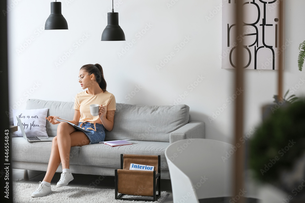 Female student studying at home