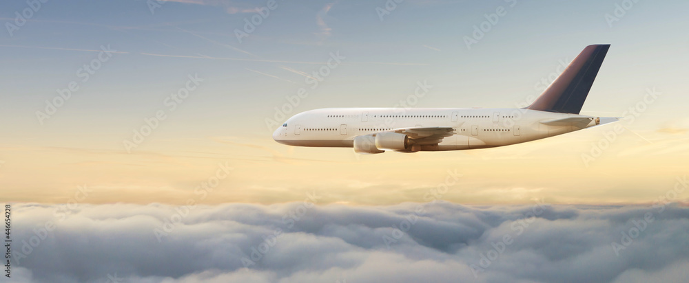 Passengers commercial airplane flying above clouds