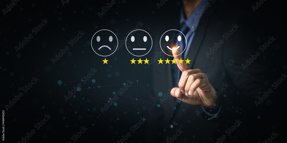 Customer Service and Satisfaction Concept Businessmen touch the virtual screen on happy smiley icons