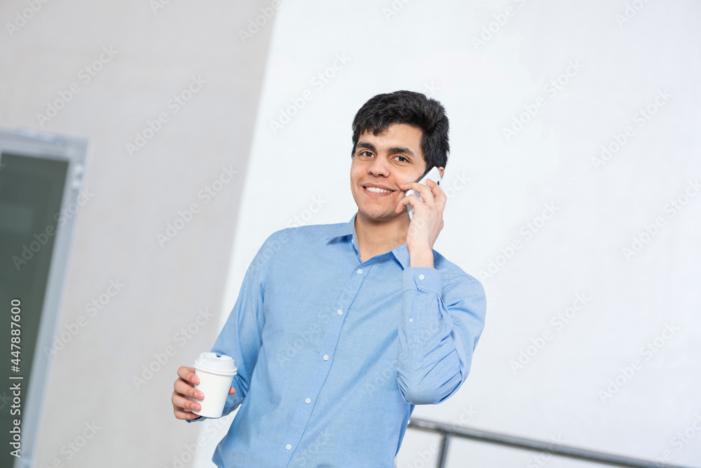 young businessman talking on his cell phone