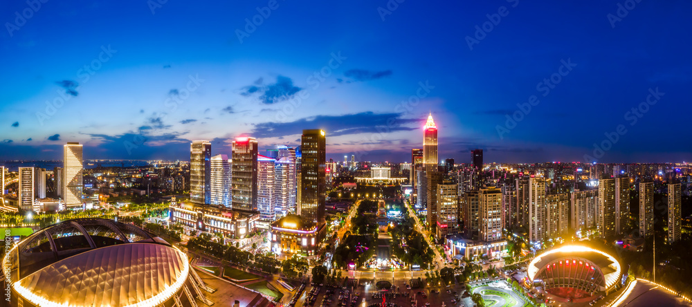 Aerial photography of the night view of Nantong Financial Center, Jiangsu