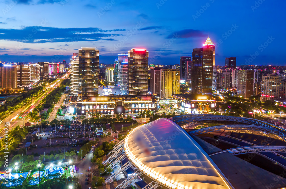 Aerial photography of the night view of Nantong Financial Center, Jiangsu