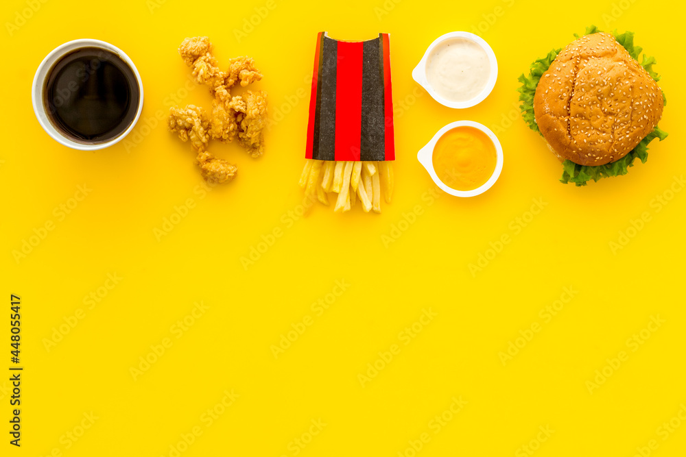 Fast food background. Hamburger chicken nuggets and french fries