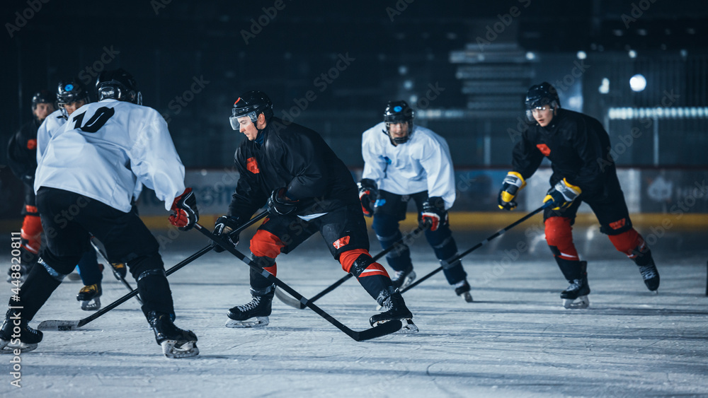 Dark Ice Hockey Rink Arena: Young Players Training, Learning Stick and Puck Handling. Athletes Learn