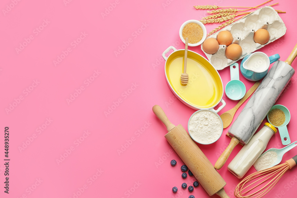 Ingredients for preparing bakery and kitchen utensils on color background