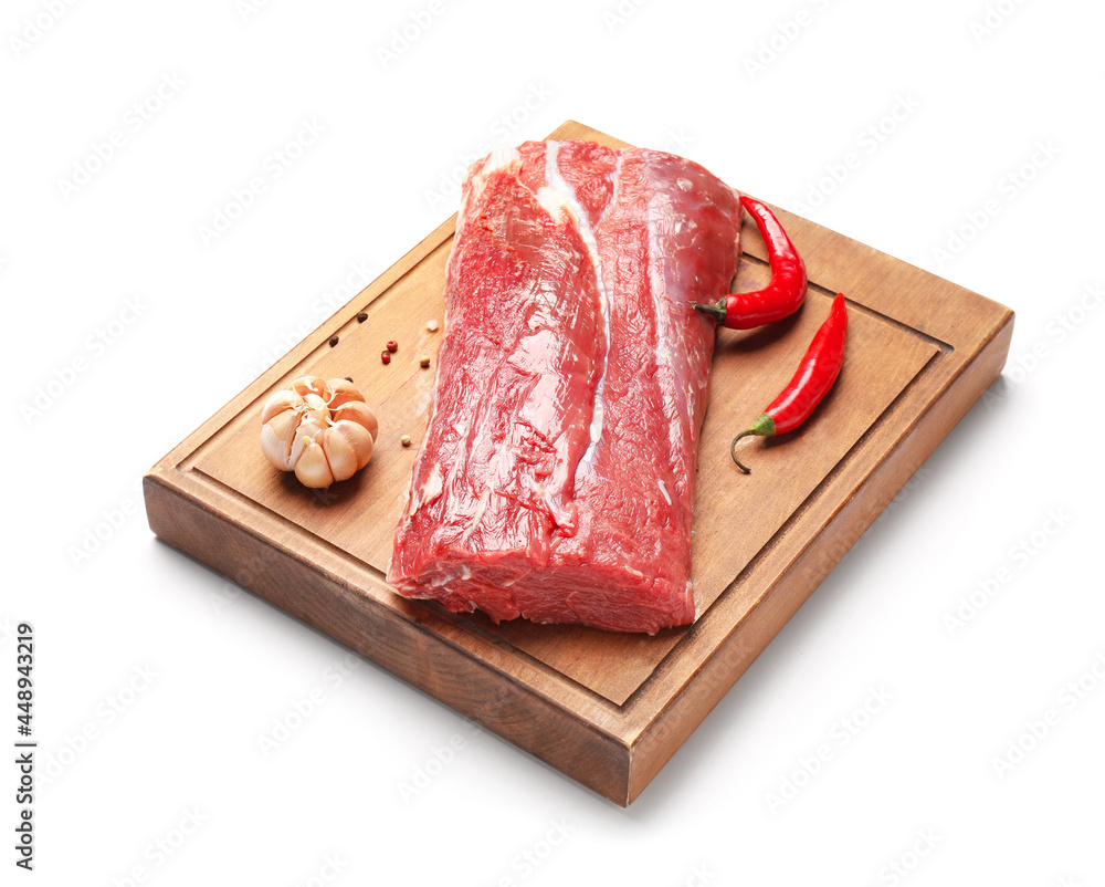 Wooden board with raw beef brisket on white background