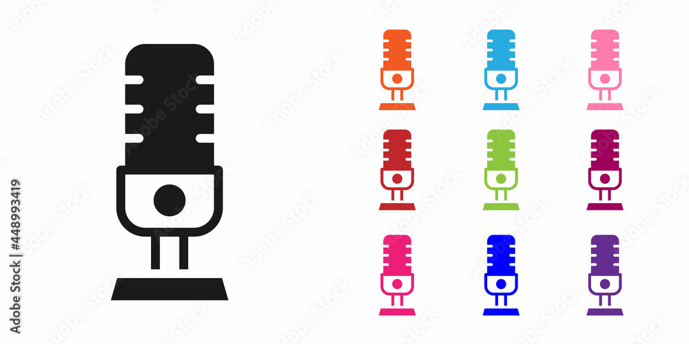白色背景上隔离的黑色麦克风图标。空中广播麦克风。扬声器标志。设置i