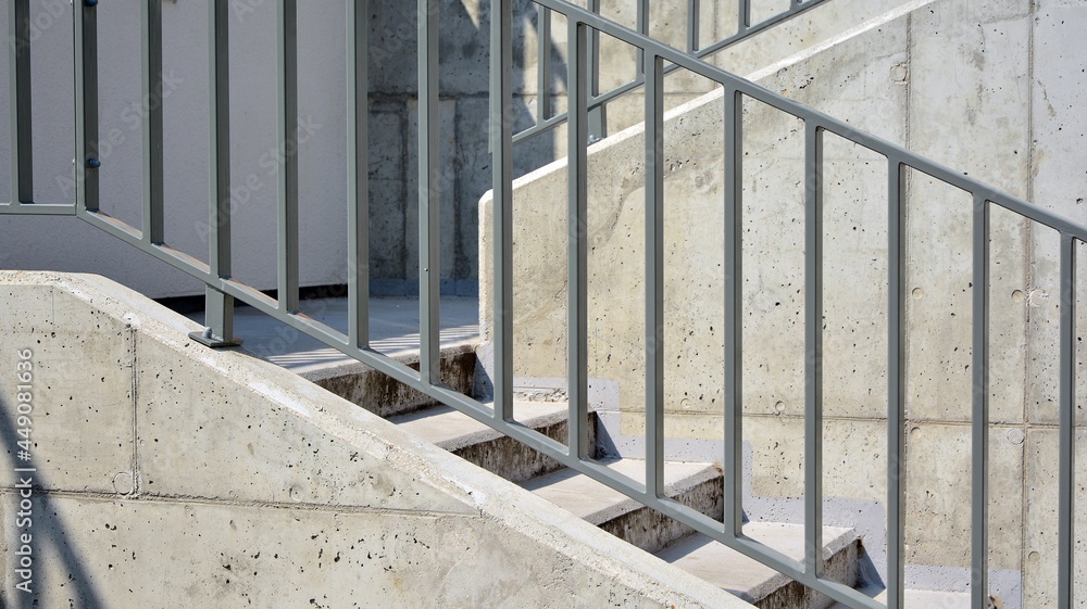 Modern concrete stairs and metal railings outside