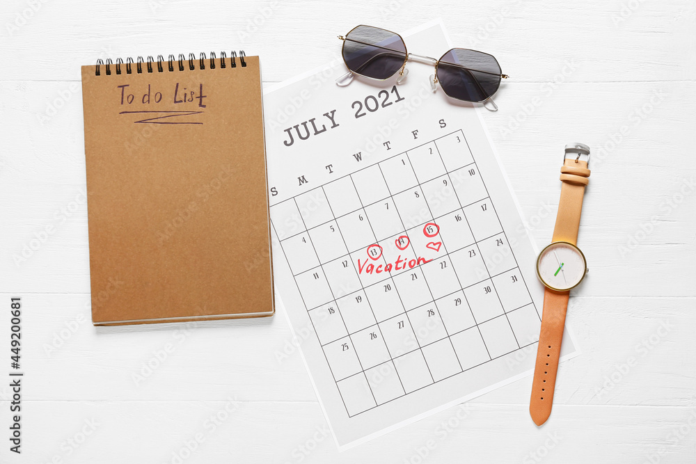 Calendar, to-do list and female accessories on light wooden background