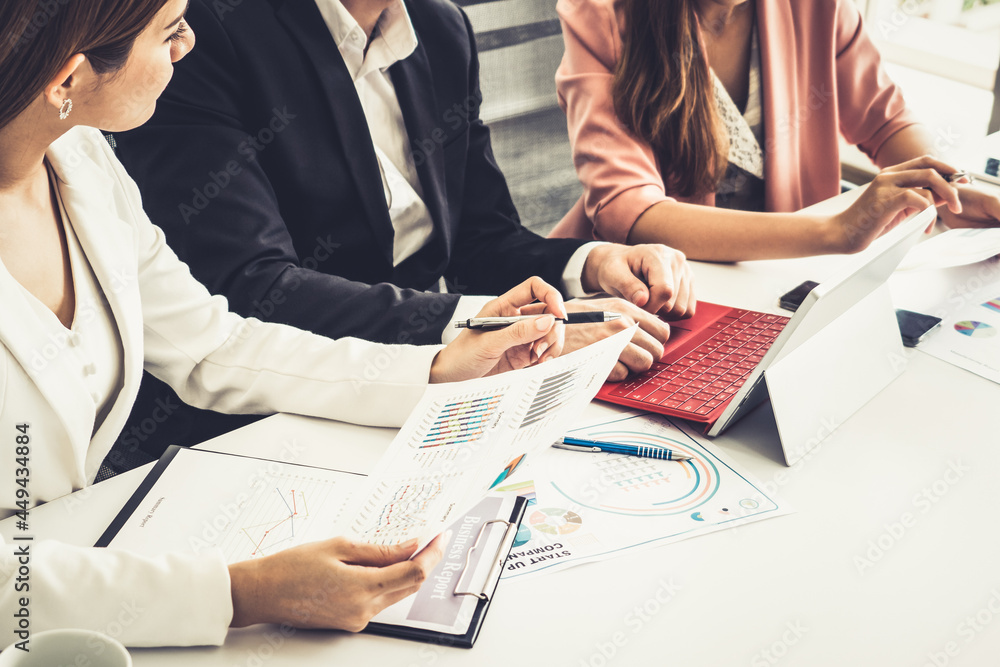 Businessman is in meeting discussion with colleague businesswomen in modern workplace office. People