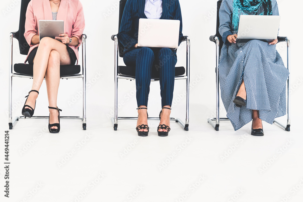 Business people job applicants sitting and waiting on chairs in office. Job application and recruitm