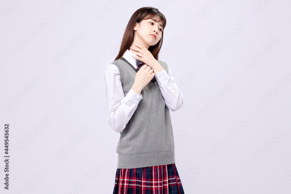 Beautiful Asian girl in middle school uniform