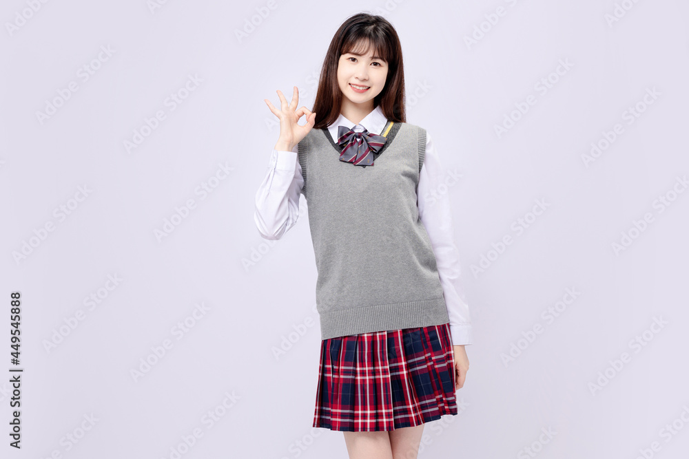 Beautiful Asian girl in middle school uniform