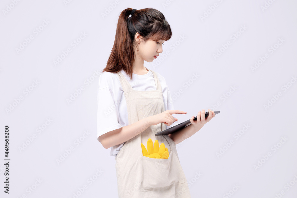 Beautiful asian woman cleaning