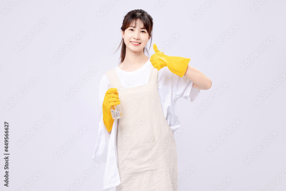 Beautiful asian woman cleaning