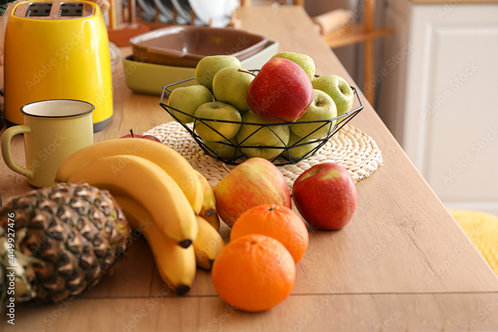 Fresh fruits on table in kitchen