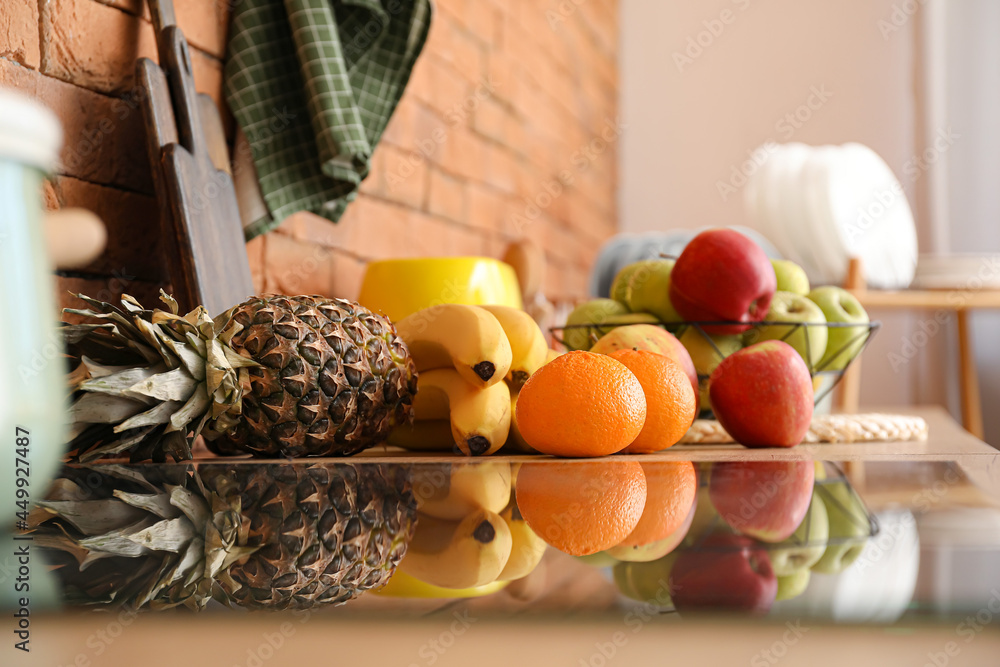 Fresh fruits on table in kitchen