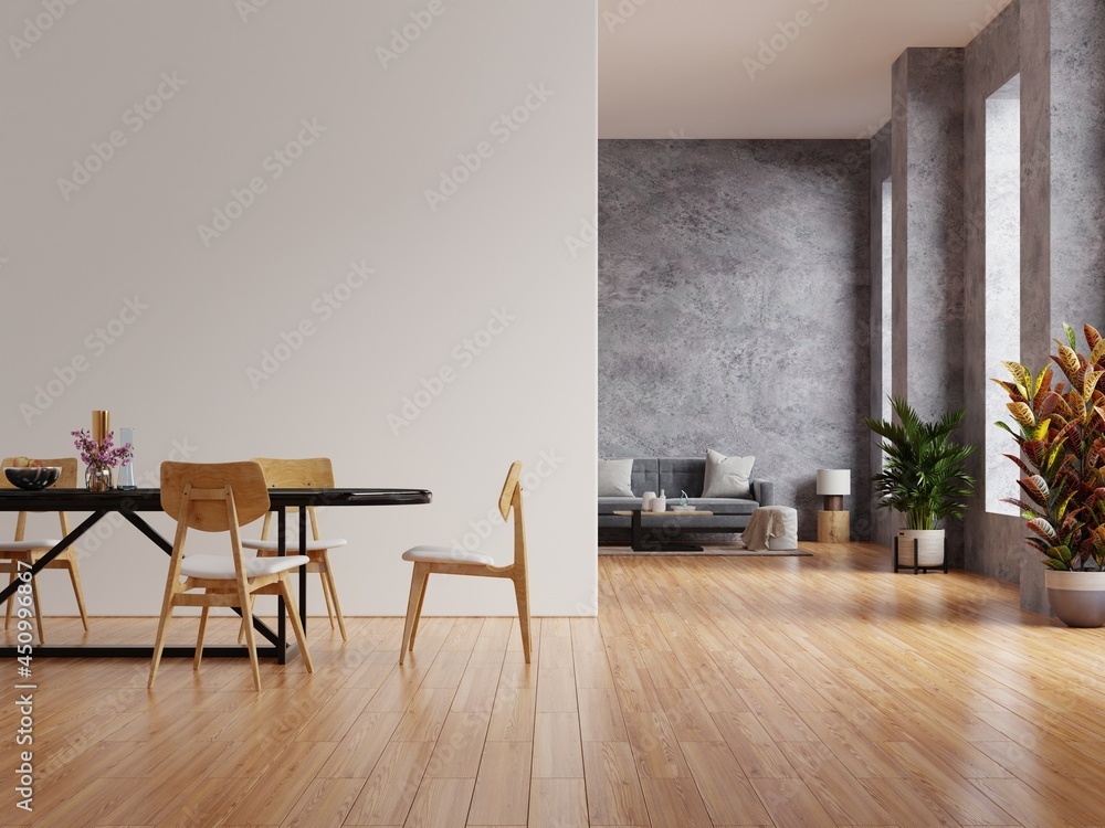 Mockup white wall in loft style house with sofa and accessories in the room.