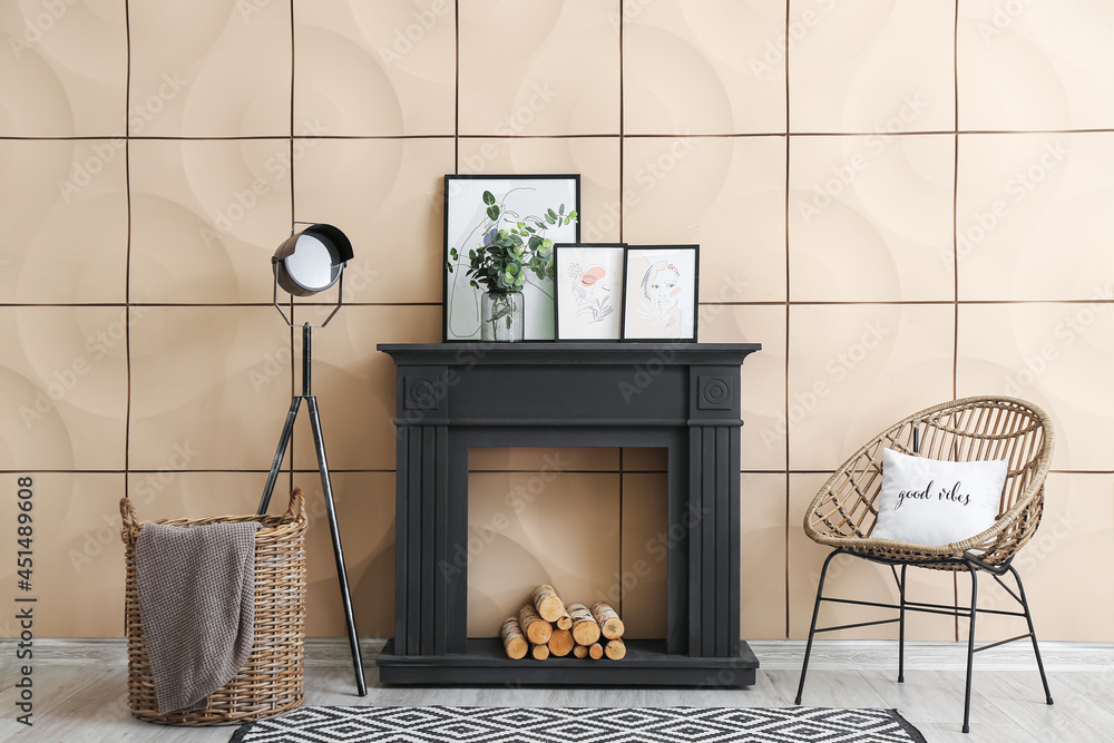 Stylish interior of room with fireplace and wicker chair and basket