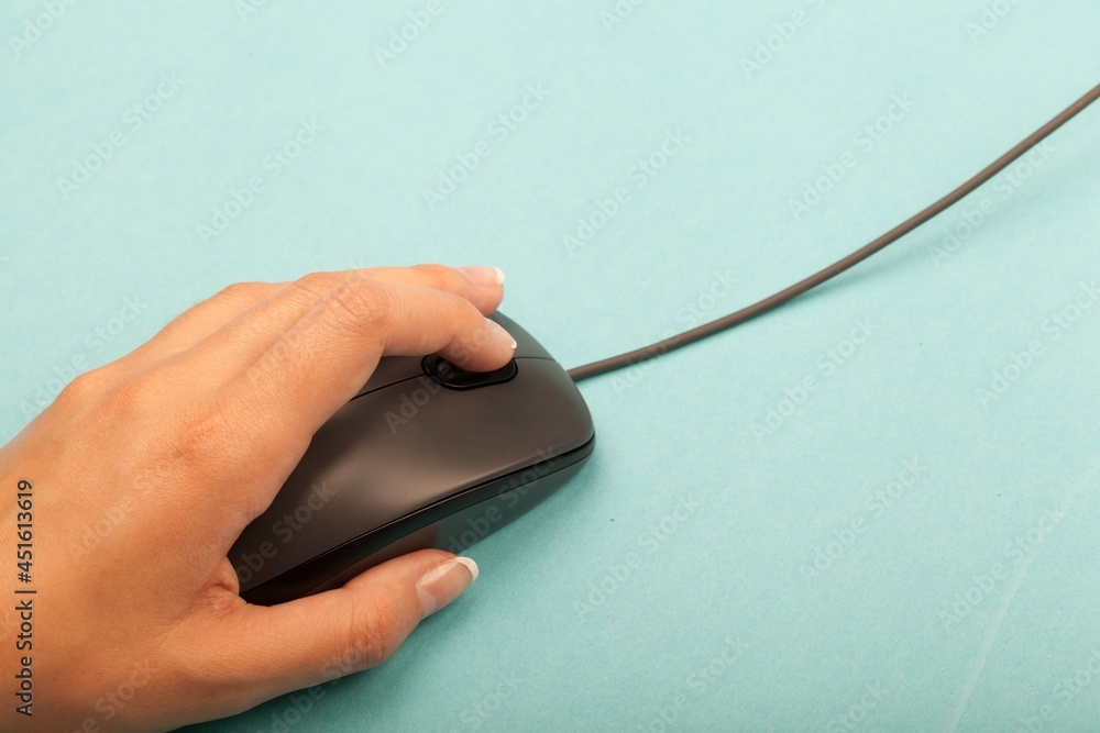 Closeup of Womans Hand Using a Mouse