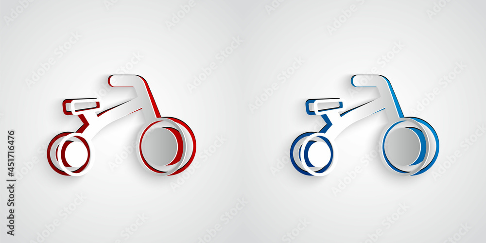 Paper cut Bicycle for kids icon isolated on grey background. Paper art style. Vector