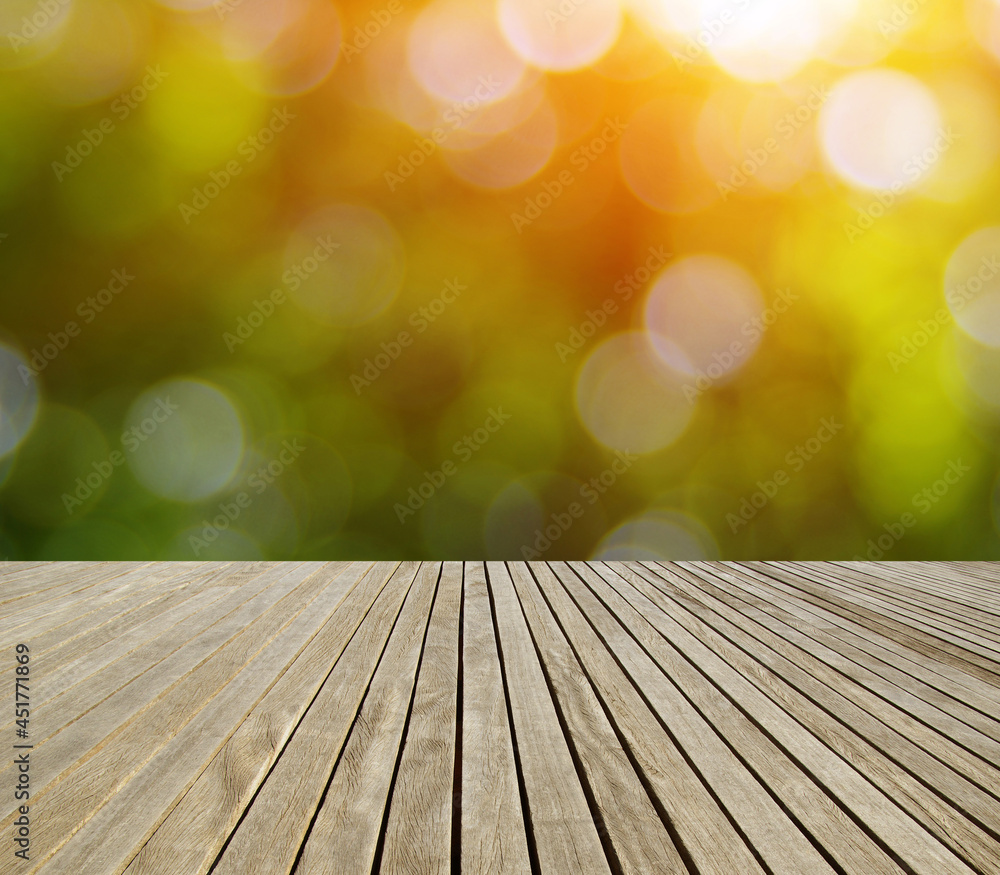 wooden table green blurred background