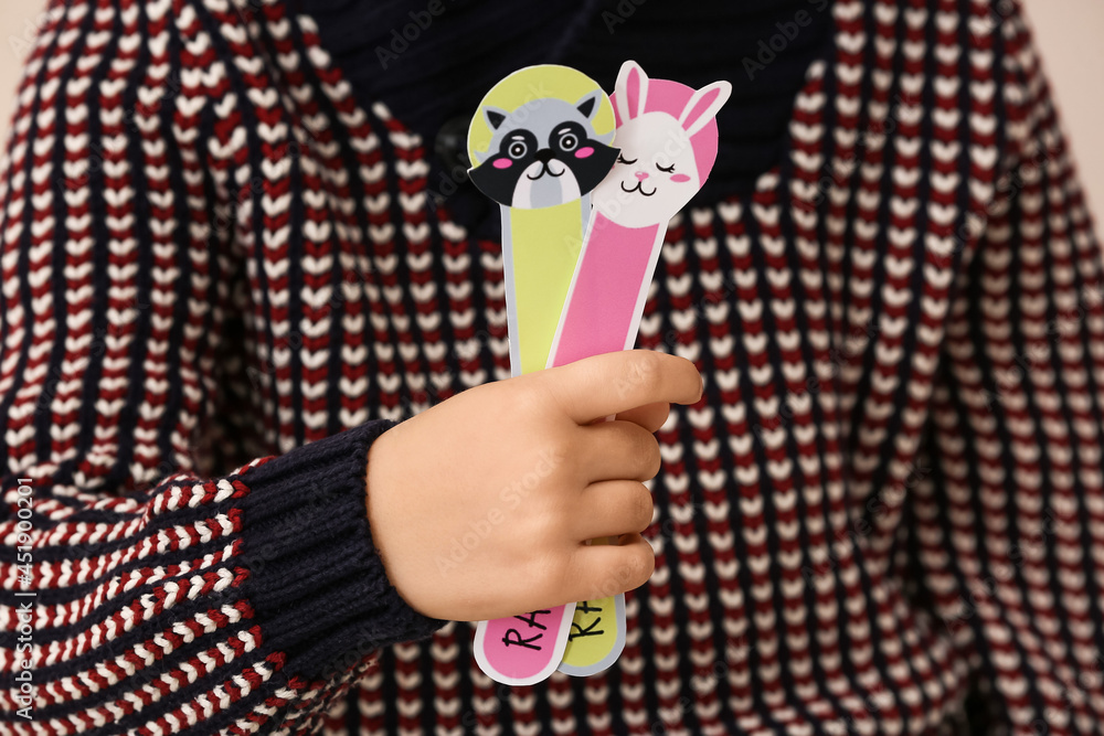 Little child with cute bookmarks, closeup