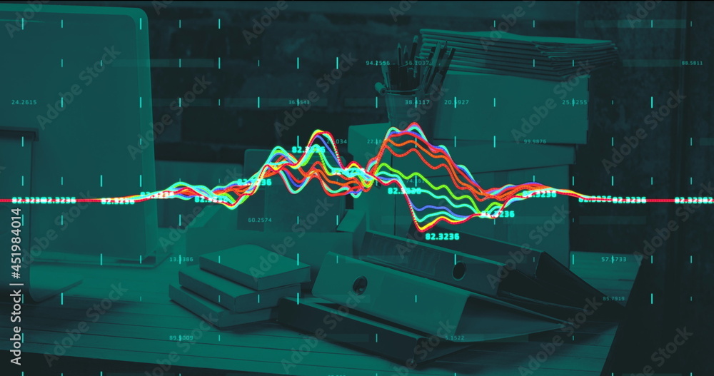 办公桌上波动线条的财务数据处理图像