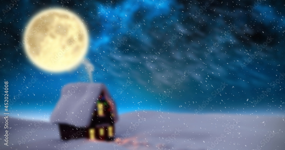 Image of winter scenery with house, full moon and snow falling