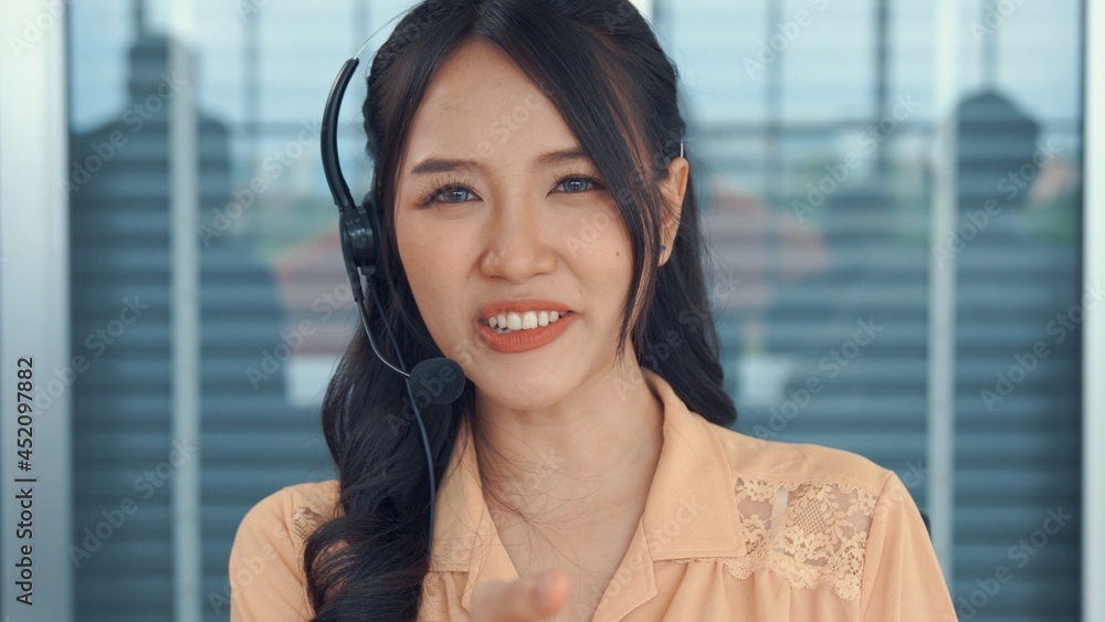 Video call camera view of businesswoman talks actively in videoconference . Call center, telemarketi