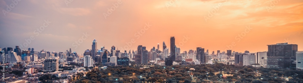 Beautiful sunset cityscape and high-rise buildings in metropolis city center . Downtown business dis