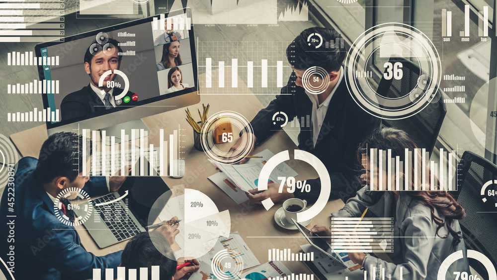 Creative visual of business people in a corporate staff meeting on video call . Concept of digital t