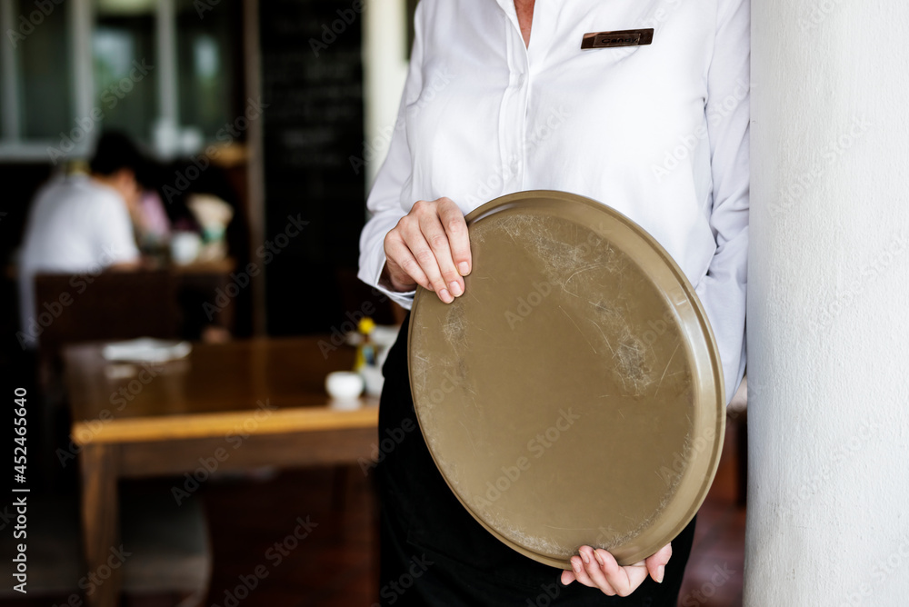 Waitress working in a hotel restaurant