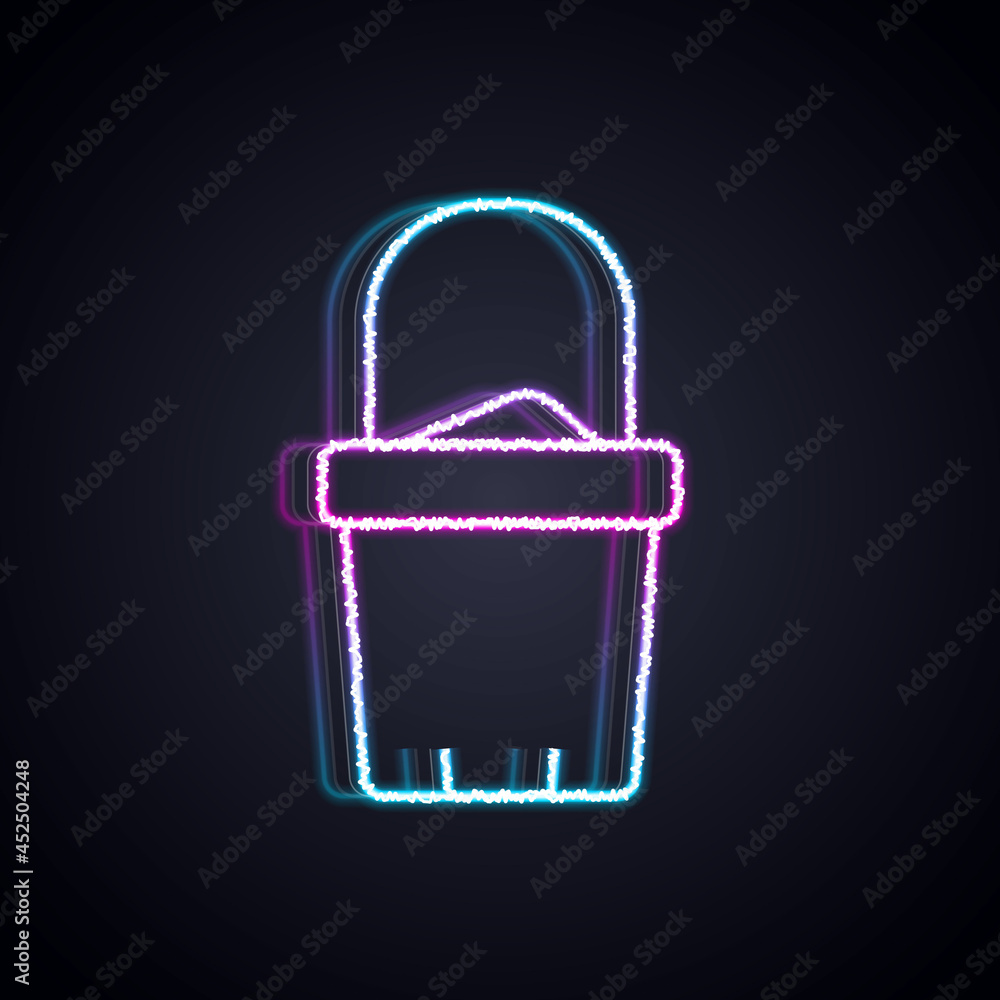 Glowing neon line Sand in bucket icon isolated on black background. Plastic kid toy. Summer icon. Ve