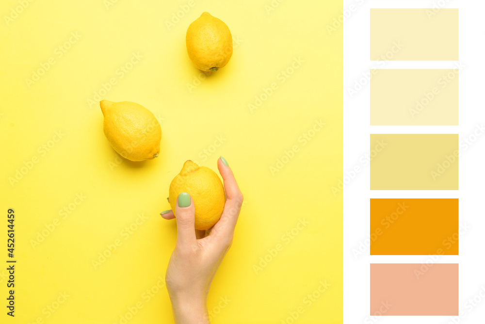 Female hand with lemons on yellow background. Different color patterns