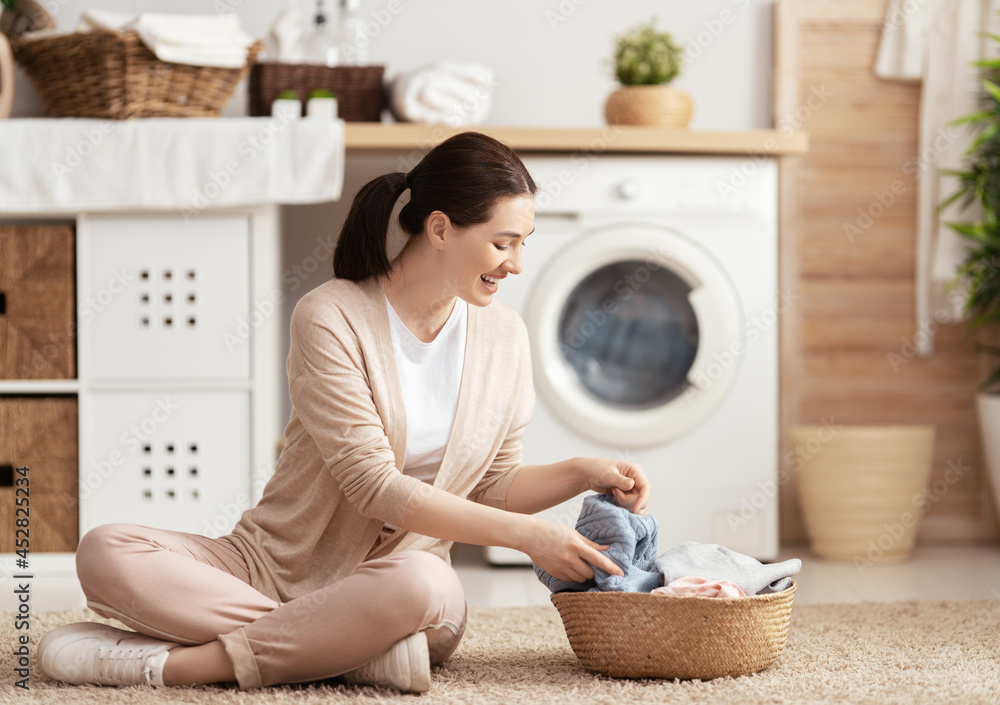 woman is doing laundry