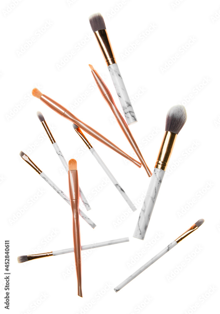 Set of cosmetic brushes on white background