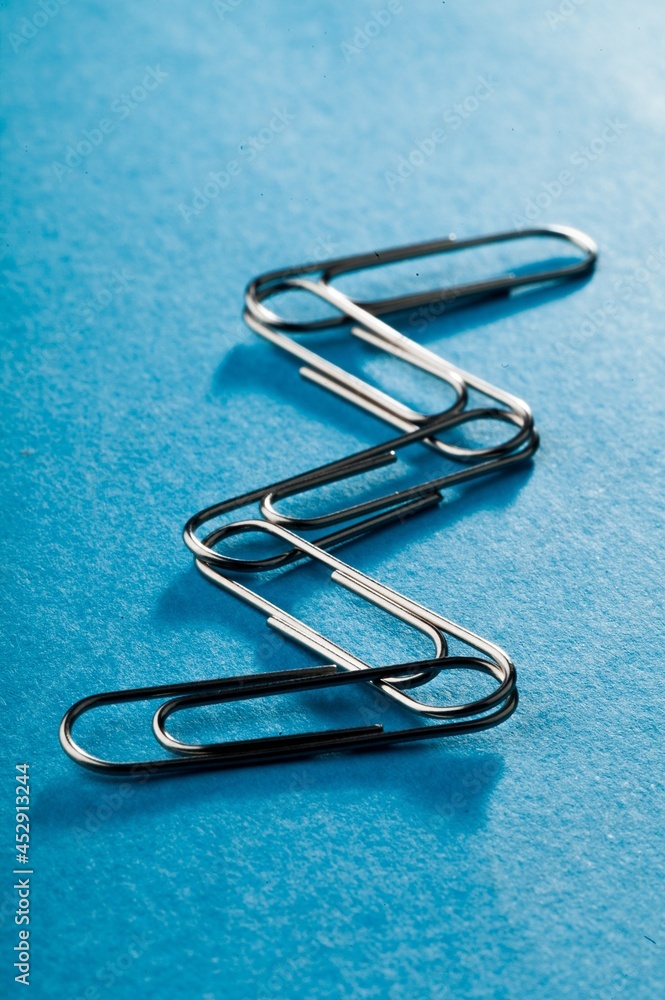 Silver Paper Clips Connected Together