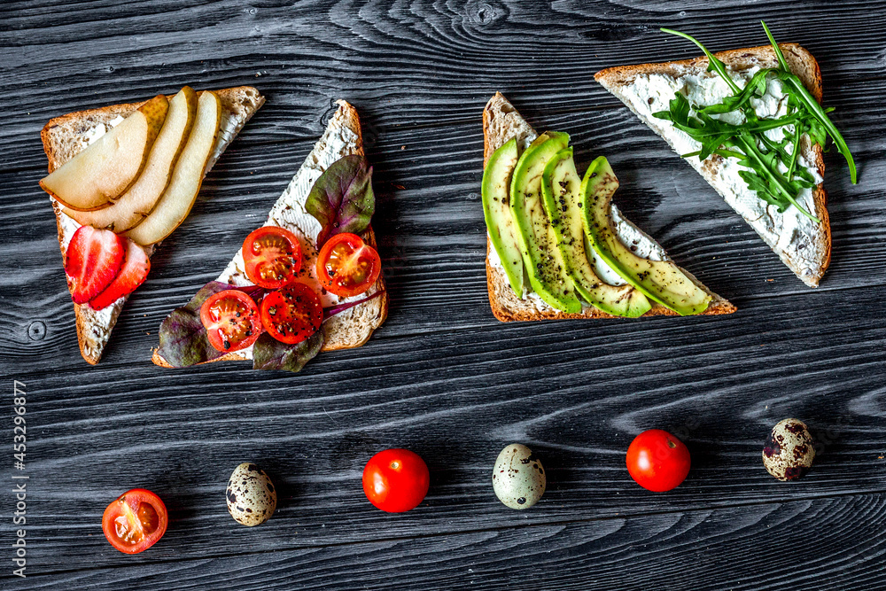 healthy breakfast with sandwiches set on white background top view