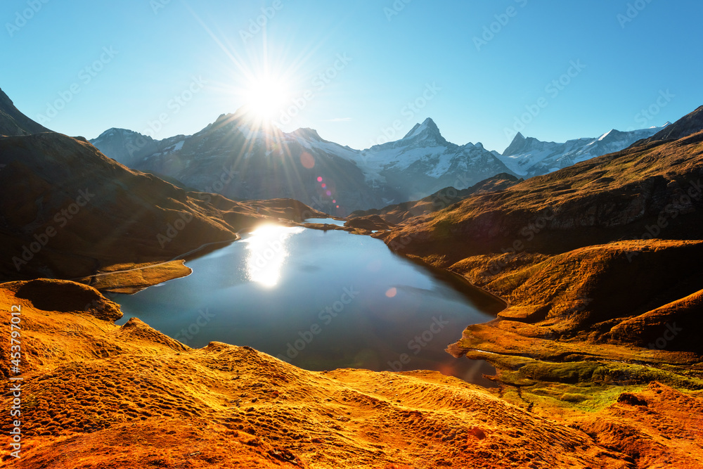 Picturesque view on Bachalpsee lake in Swiss Alps mountains