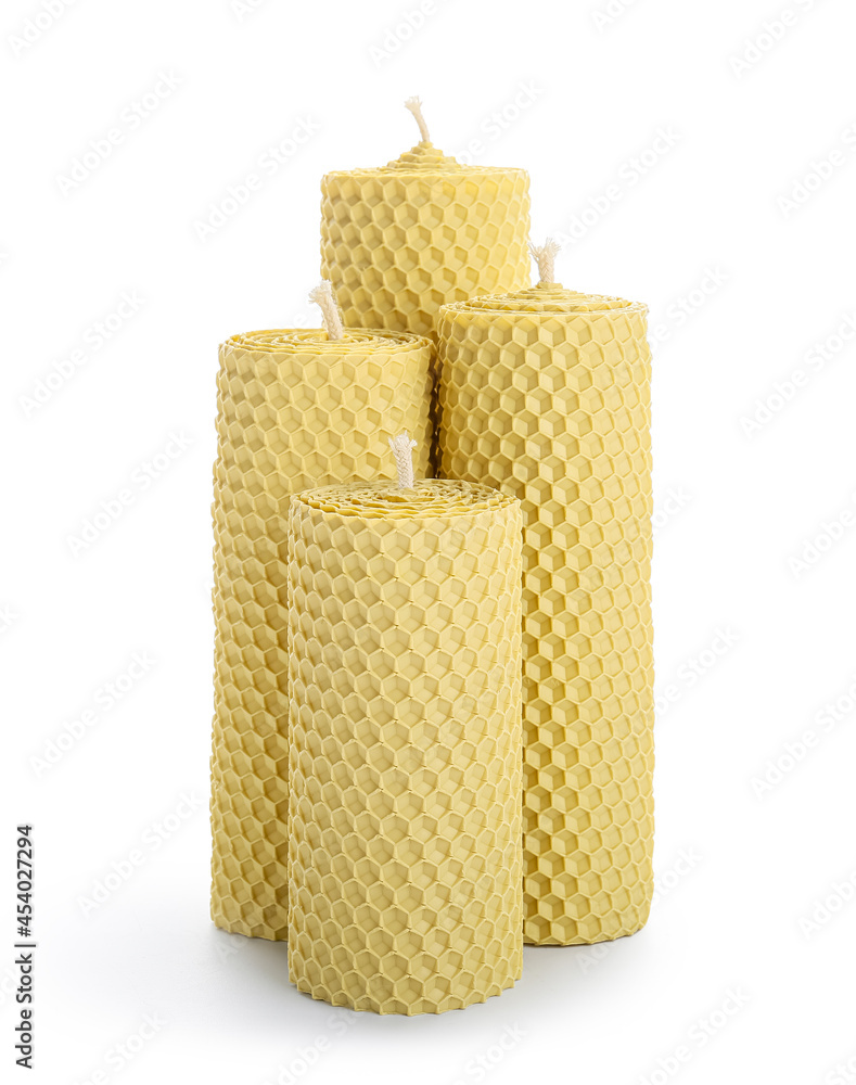 Wax candles on white background