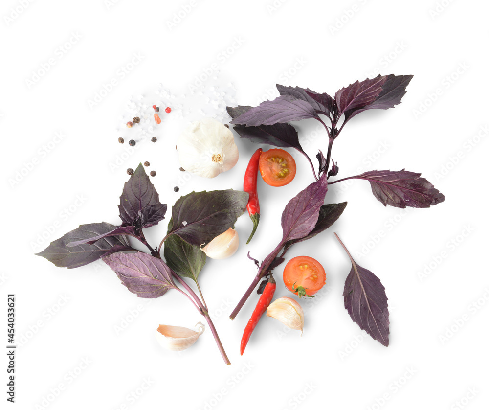 Fresh basil, garlic, tomato and chili pepper on white background