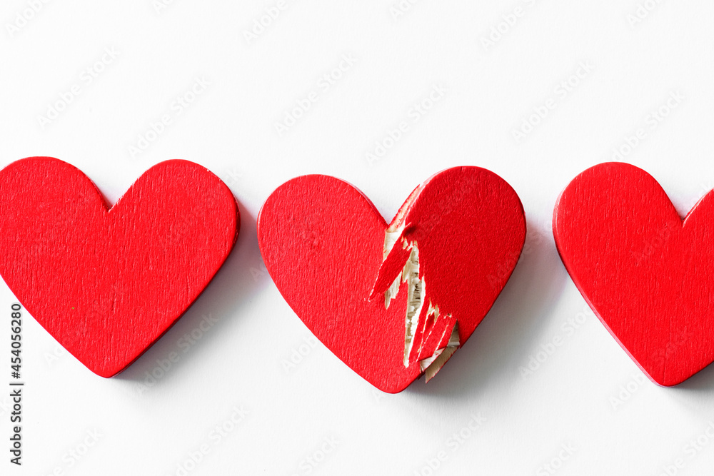 Closeup of red hearts on white background